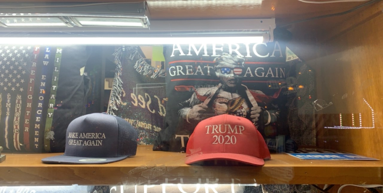 Trump 2020 hats and pillows displayed in store front window in Gatlinburg